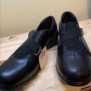 Skechers size 11 new with tags slip on black